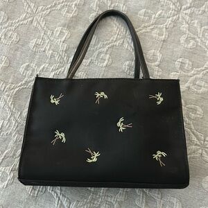 Black fabric small purse with palm trees